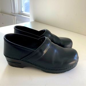 Dansko black leather clogs